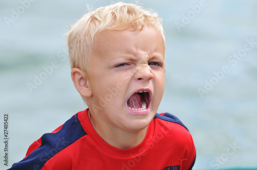 Little Boy Reacts Emotionally photo