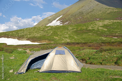 Tourist tent in a mountain landscape