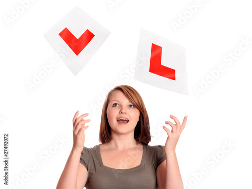 Pretty teenage girl passing her driving test