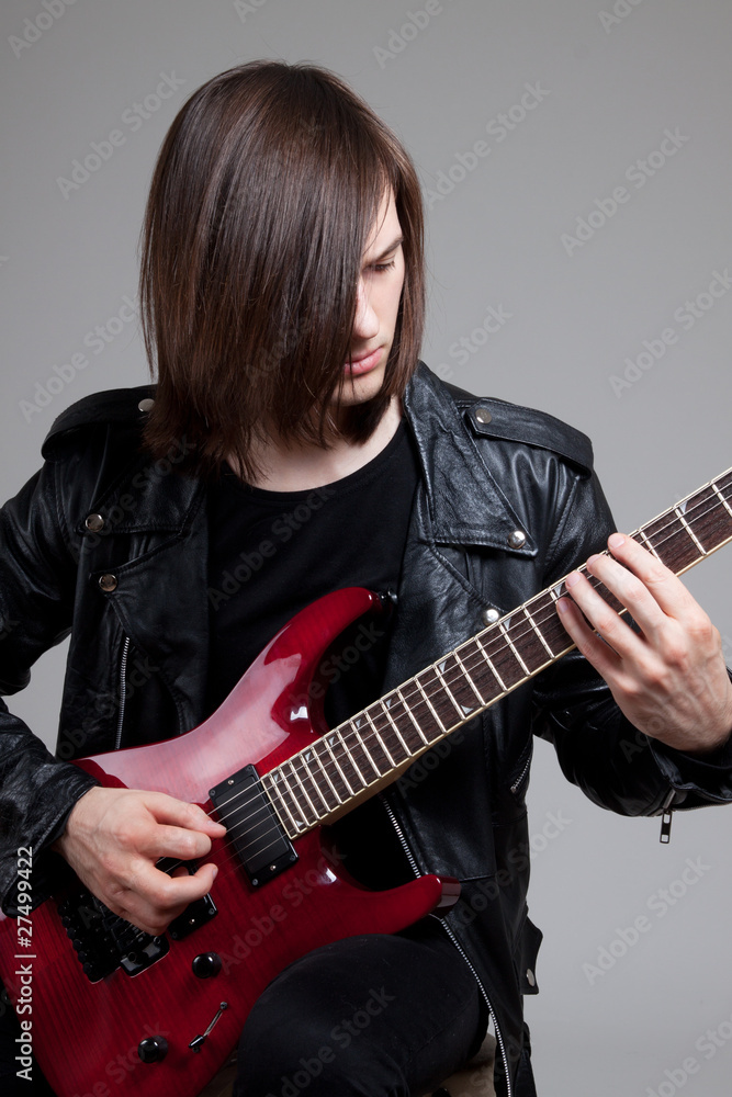 Obraz premium punk playing guitar