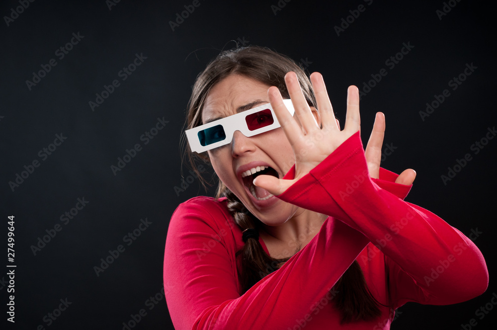 Naklejka premium Teenager watching 3D movie