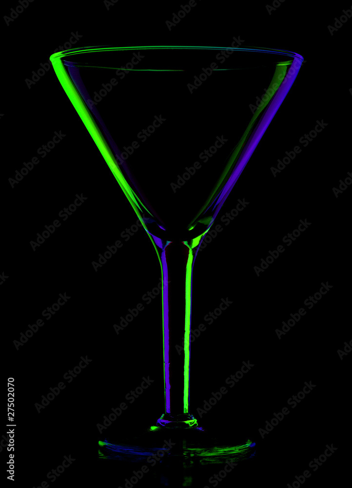 transparent colored empty martini glass on black transparent colored empty martini glass on black