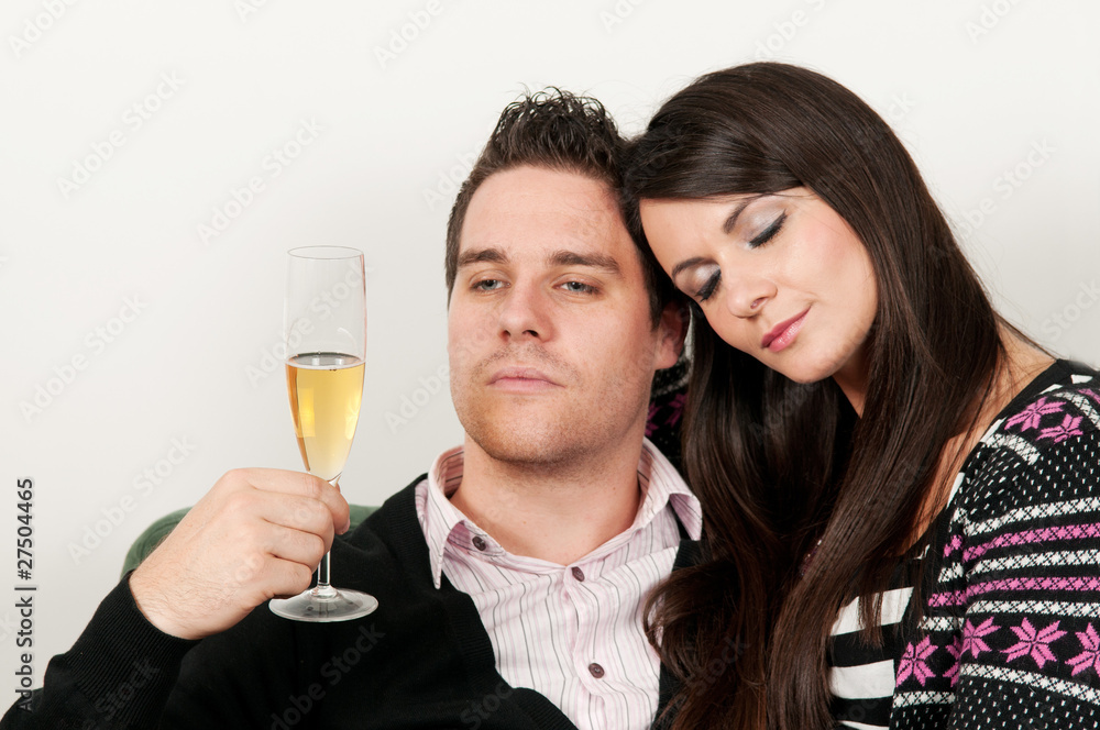 Young couple drinking champagne