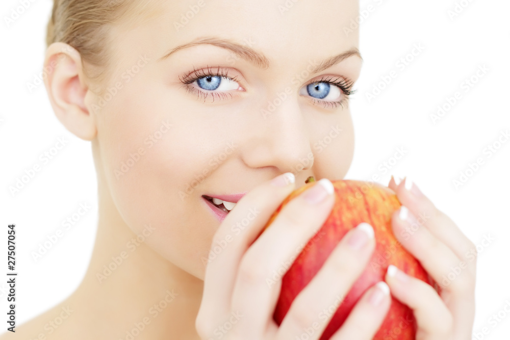 Beautiful girl holding a red apple isolated on white background Beautiful girl holding a red apple isolated on white background