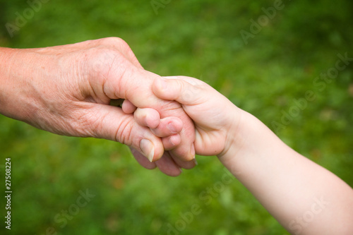 Holding Hands - Love between Child and Grandparent © andystjohn