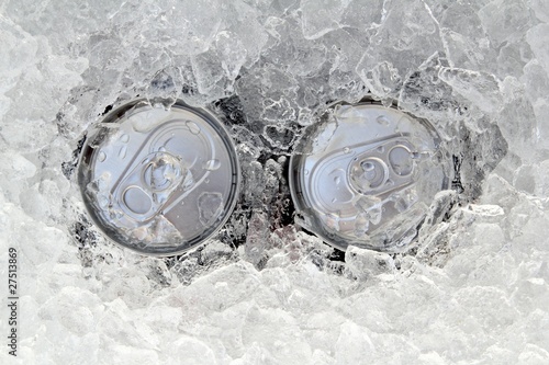 two drink can iced submerged in frost ice