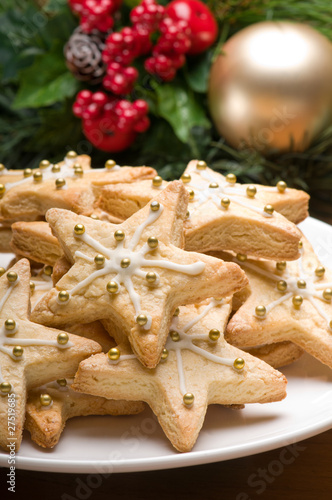 Decorated christmas cookies in festive setting photo