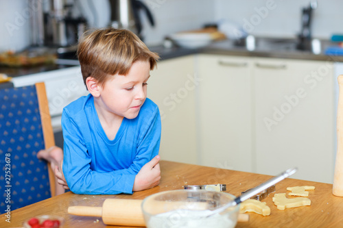 Boy helping at kitchen