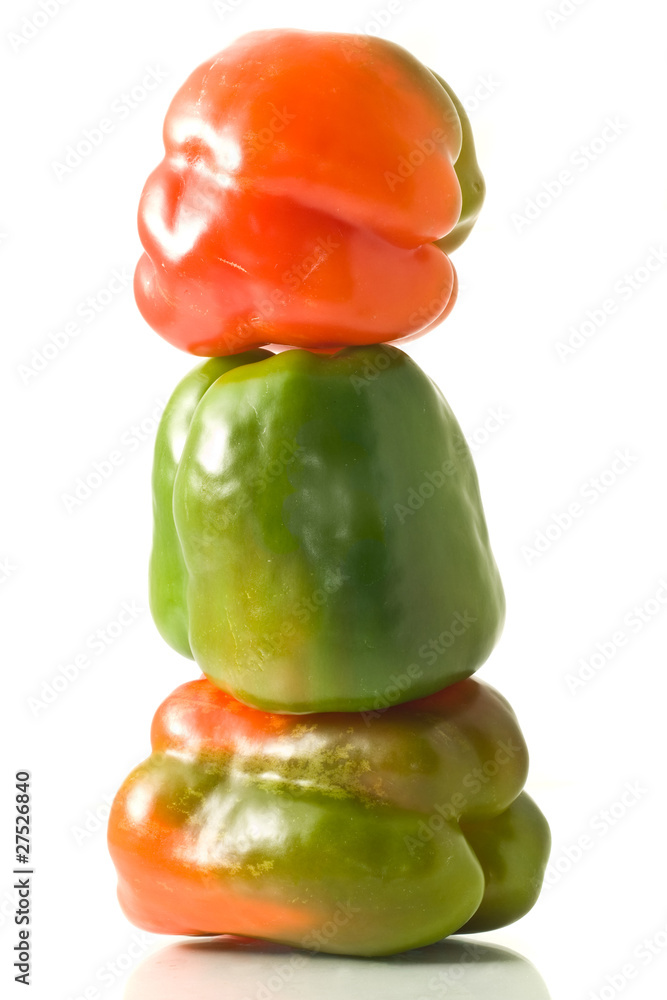 Three Bell peppers stack on white Three Bell peppers stack on white