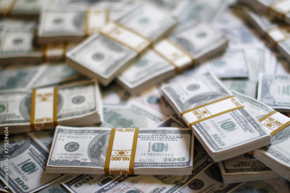 A pile of $10,000 bundled stacks A pile of $10,000 bundled stacks