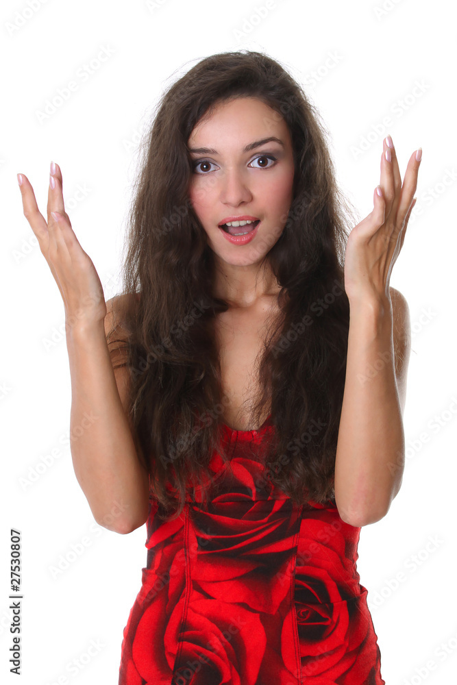 Close-up of a young woman looking surprised on white background Close-up of a young woman looking surprised on white background