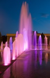 Light illumination of a city fountain at night