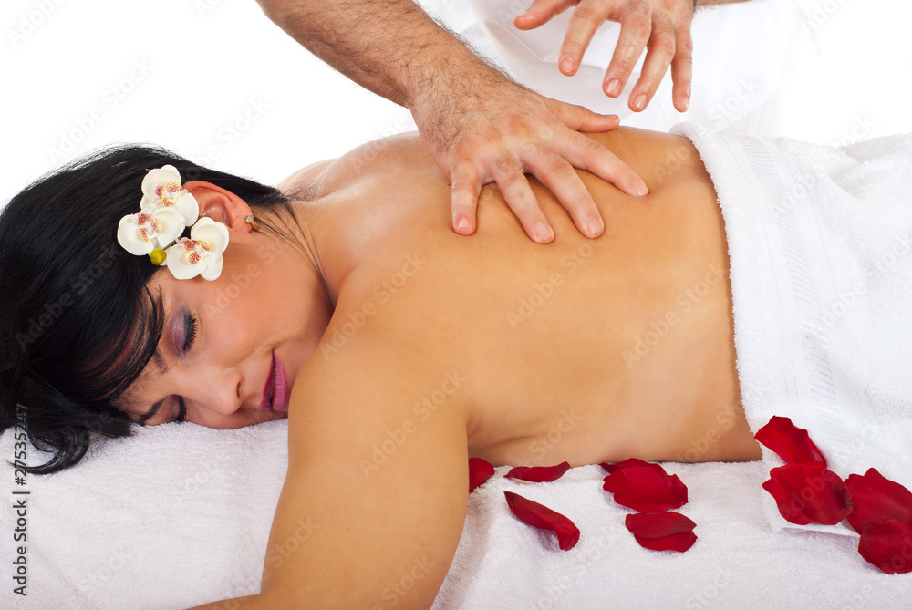 Woman enjoying a spa massage Woman enjoying a spa massage