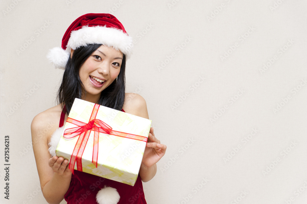 a portrait of santa woman taking present a portrait of santa woman taking present