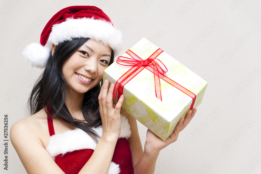 a portrait of santa woman taking present a portrait of santa woman taking present