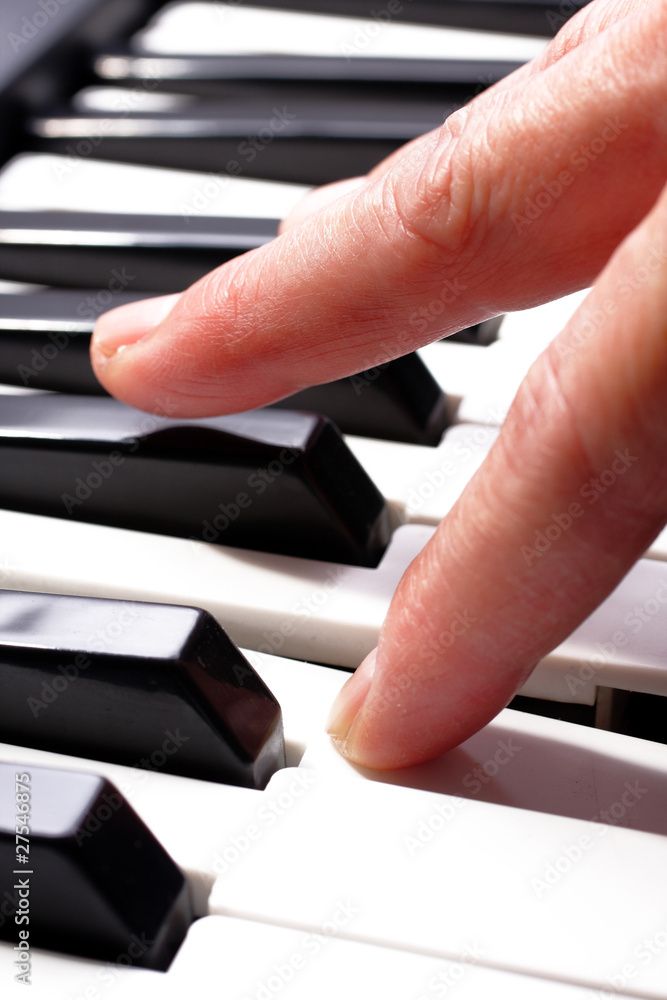 Fototapeta premium hands playing music on the piano, hands and piano player, keyboa