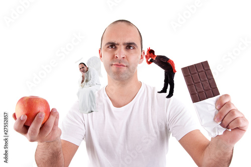 man choosing apple or chocolate,between devil and angel