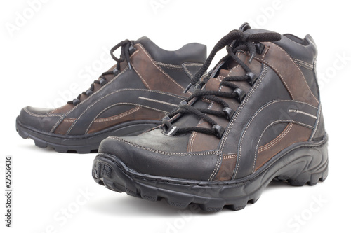 Black leather shoes on a white background