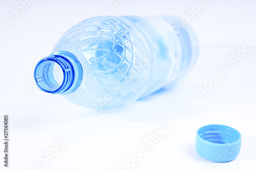 Plastic bottles on white background photo