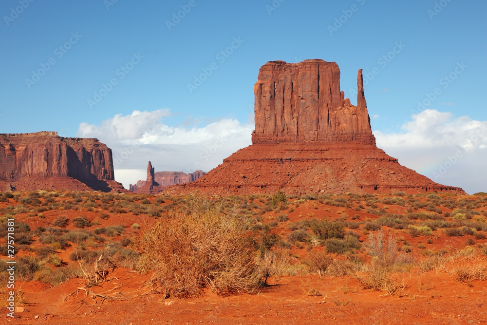 The bright orange sandstone rock