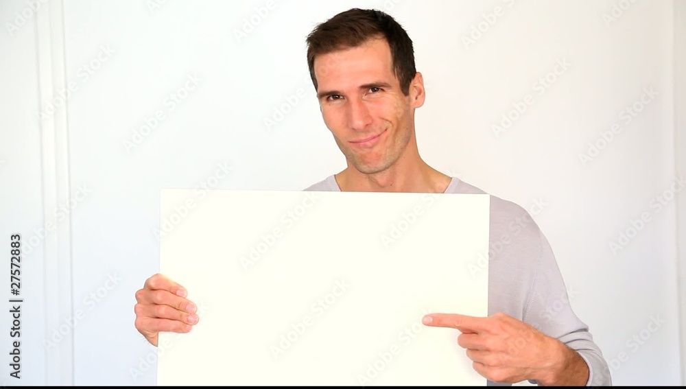 Man holding white board for product promotion Man holding white board for product promotion