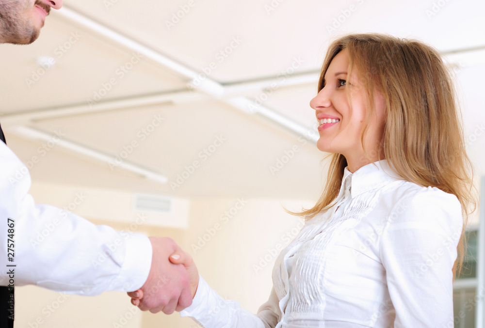 Fototapeta premium young girl shakes hands