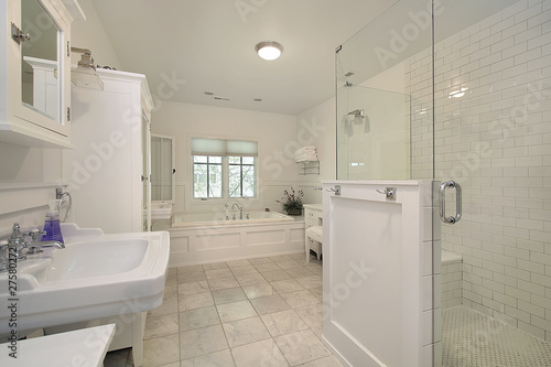 Master bath with white cabinetry