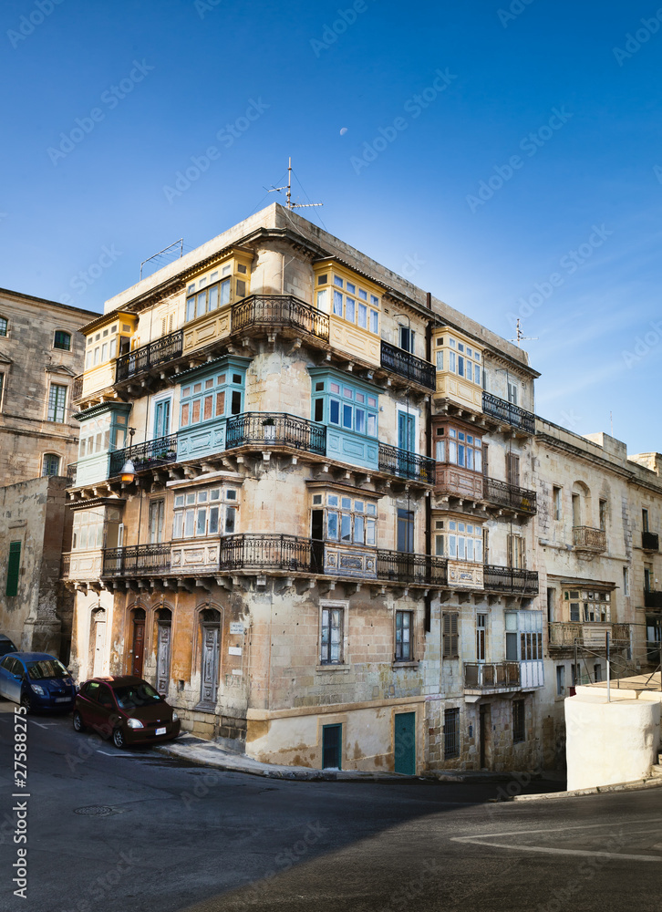 Typical Maltese building with balconies