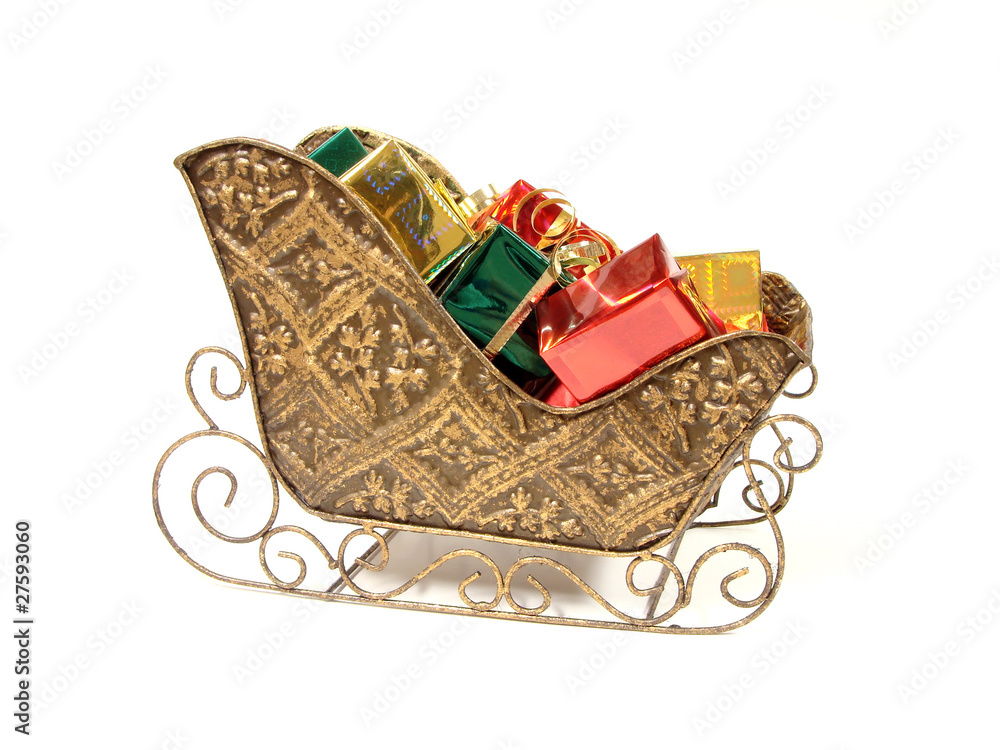 Decorative Christmas sleigh filled with colorfully wrapped gifts Stock ...