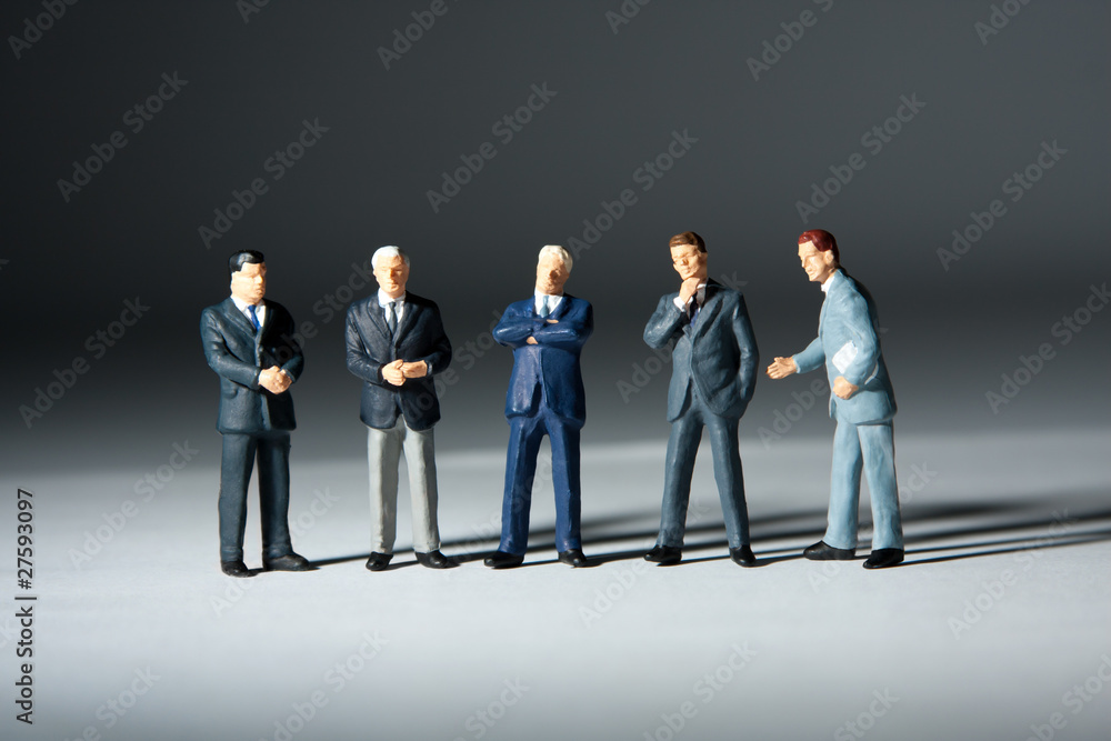 Miniature figurines of successful business team Miniature figurines of successful business team