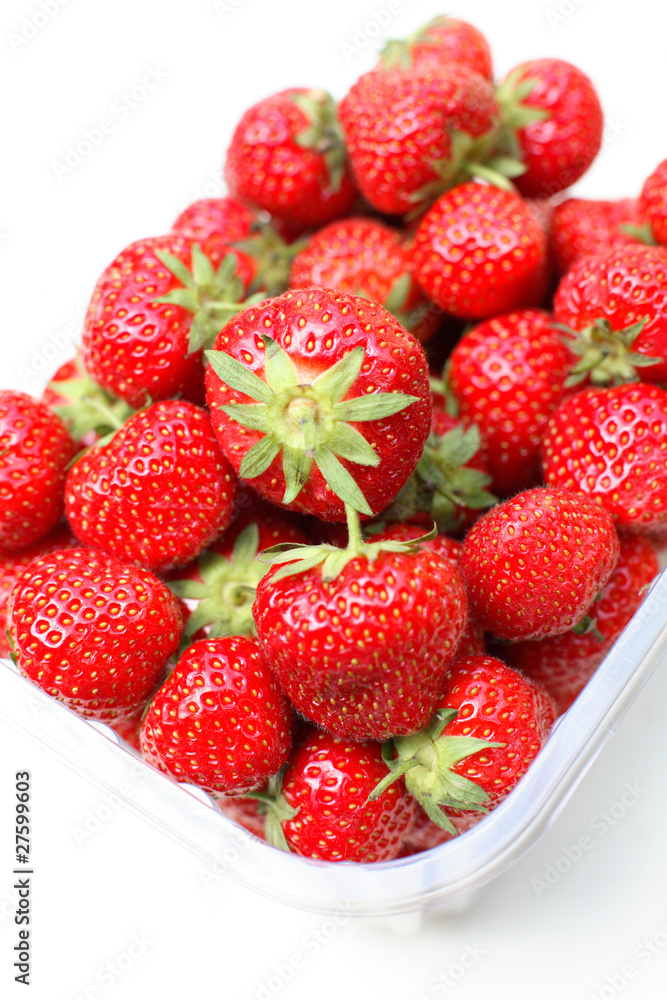 Freshly picked strawberries in punnet Freshly picked strawberries in punnet