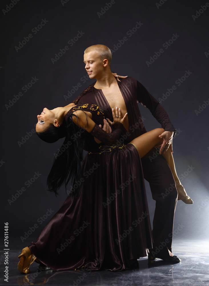 dancers against black background dancers against black background