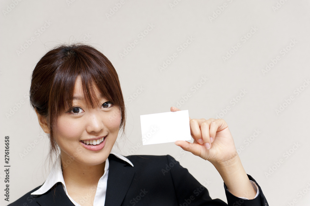 a portrait of young business woman have a card a portrait of young business woman have a card