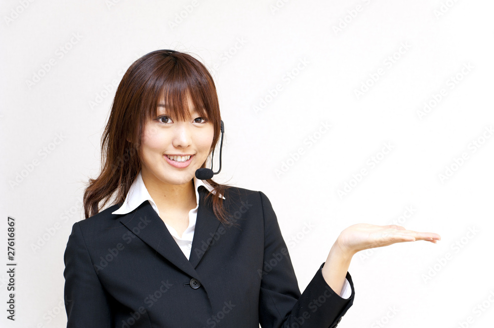 a portrait of young business woman with haedset a portrait of young business woman with haedset