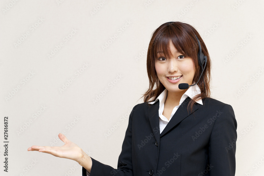 a portrait of young business woman with haedset a portrait of young business woman with haedset