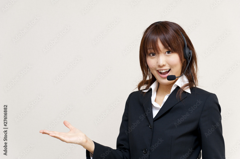 a portrait of young business woman with haedset a portrait of young business woman with haedset
