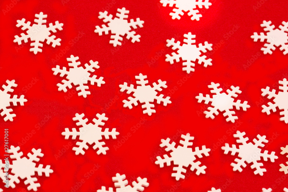 white snowflakes on a red background white snowflakes on a red background
