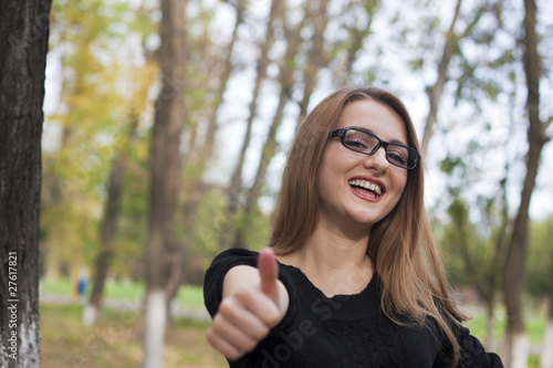 Cute girl pointing okay