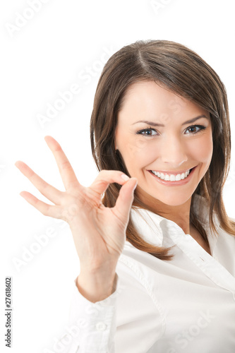 Portrait of happy smiling businesswoman with okay gesture photo