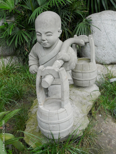 statue de porteur d'eau photo