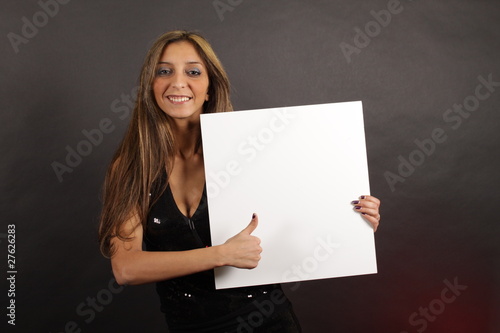 Quadro em tela Junges schönes Nummerngirl mit Daumen hoch