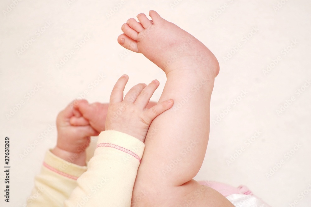 Baby is playing with feet Baby is playing with feet
