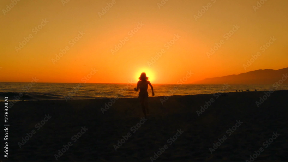 Girl runs on beach at sunset slow motion / gold - HD Girl runs on beach at sunset slow motion / gold - HD
