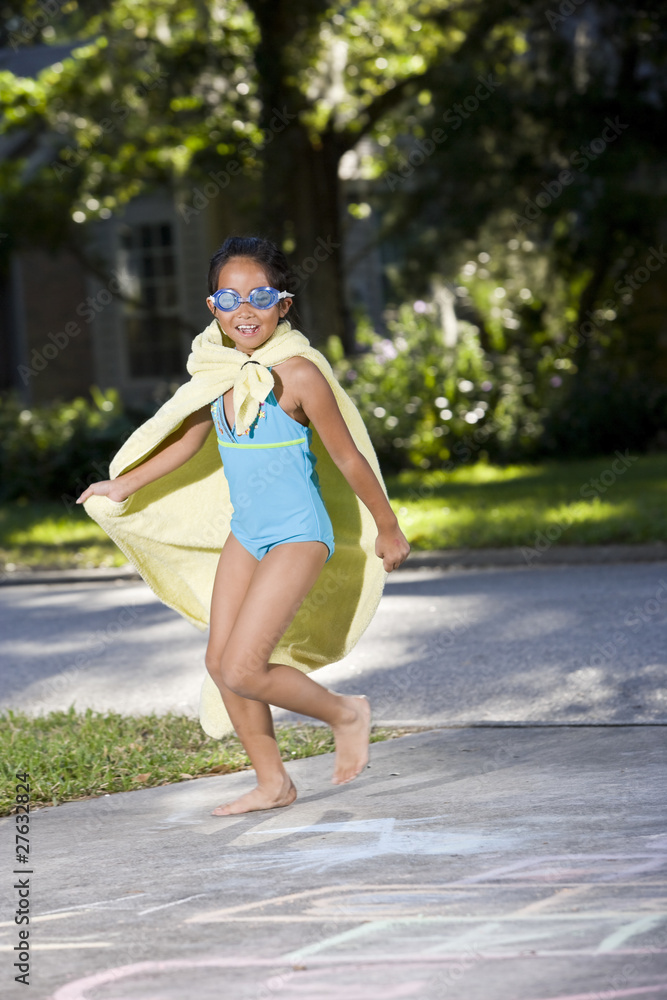 Make-believe, girl in homemade superhero costume