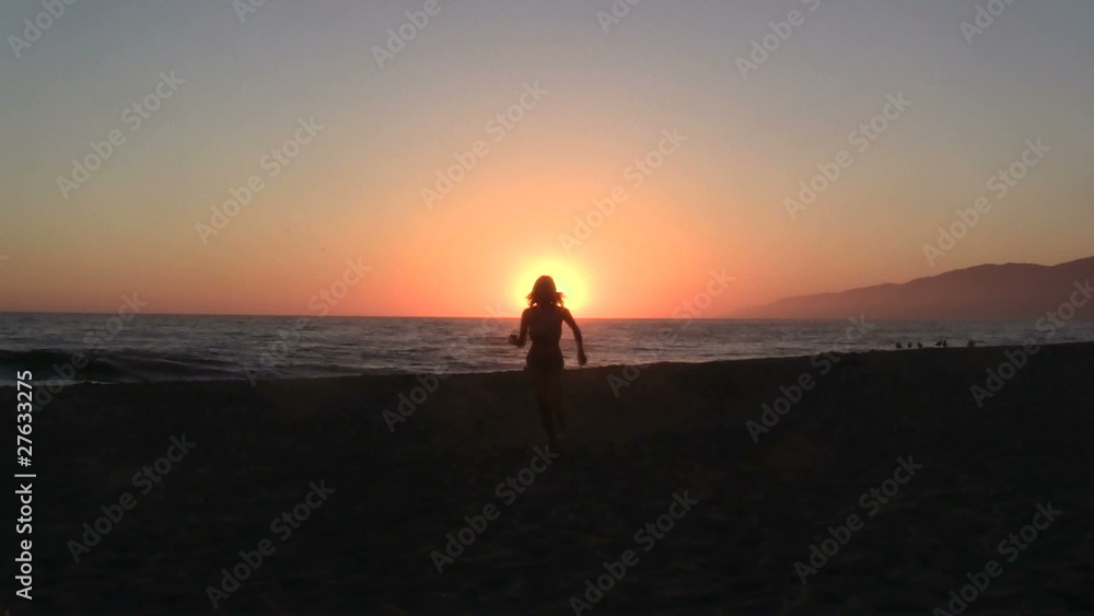 Girl runs on beach at sunset slow motion - HD Girl runs on beach at sunset slow motion - HD