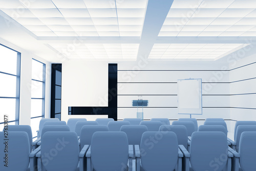 conference room with microphones and visual board