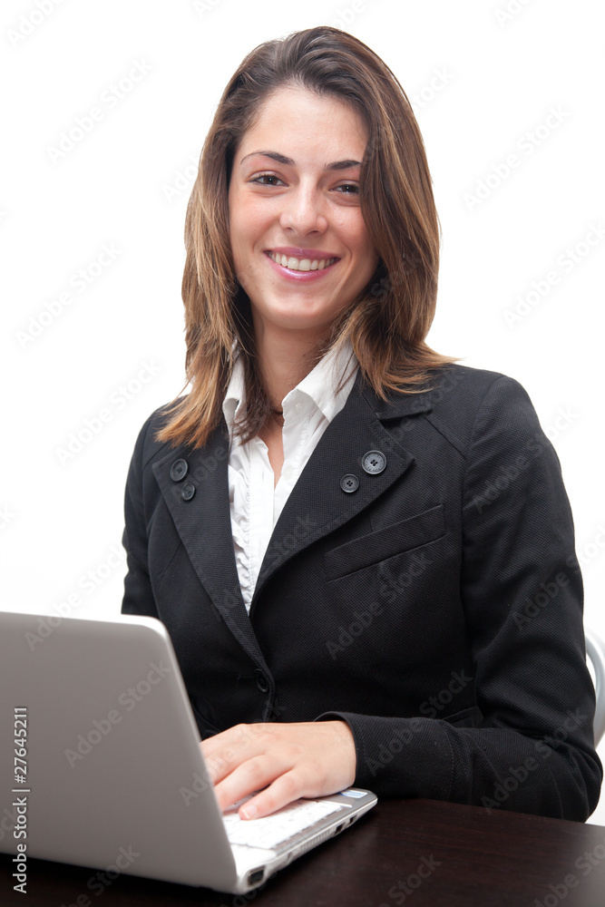 Successful young business woman working at the laptop Successful young business woman working at the laptop