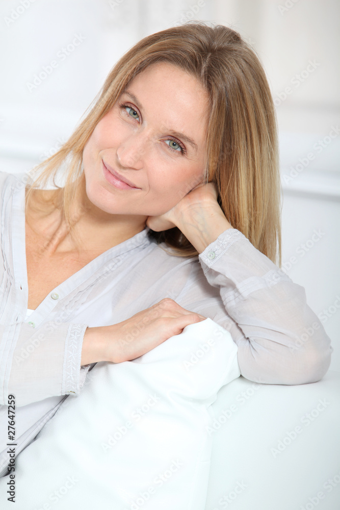 Closeup of beautiful blond woman relaxing at home Closeup of beautiful blond woman relaxing at home