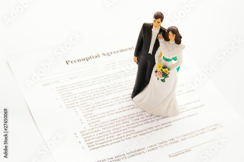 cake-topper wedding couple and a pre-nuptial agreement photo