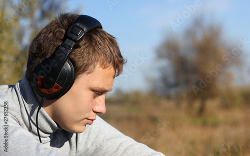 Boy Enjoying Music © Maxim P